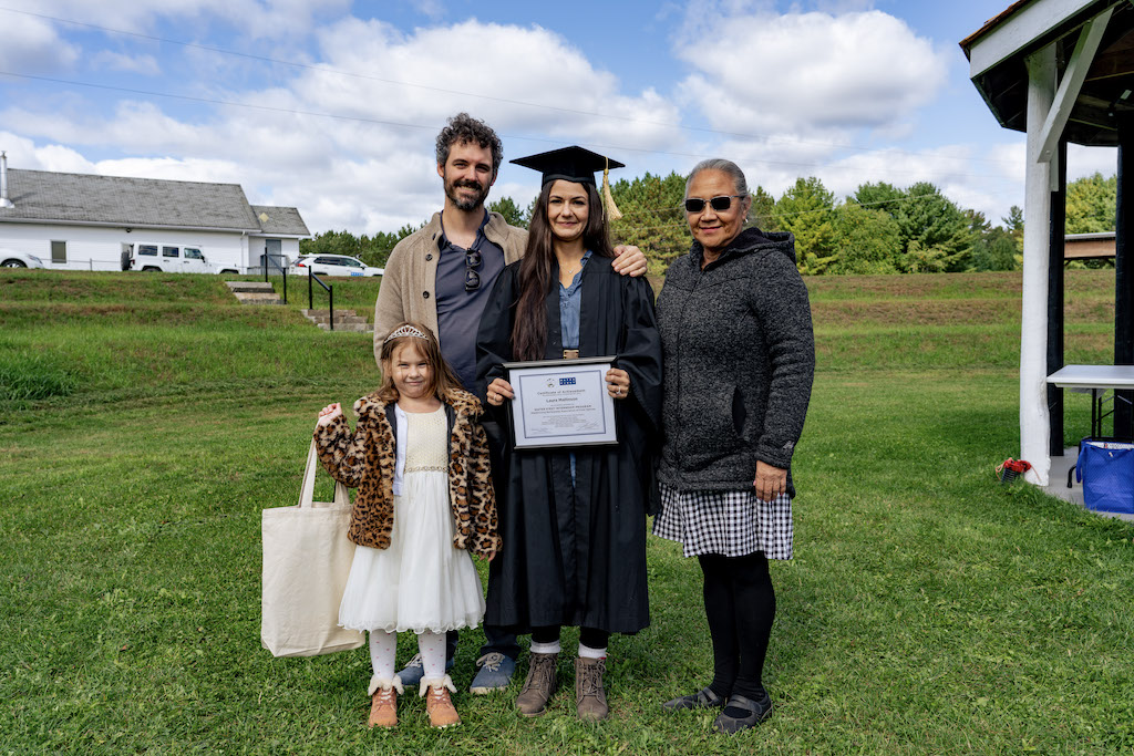 Laura Mallinson's graduation with family members | Photo: Water First